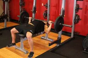 Barbell bench press, end position